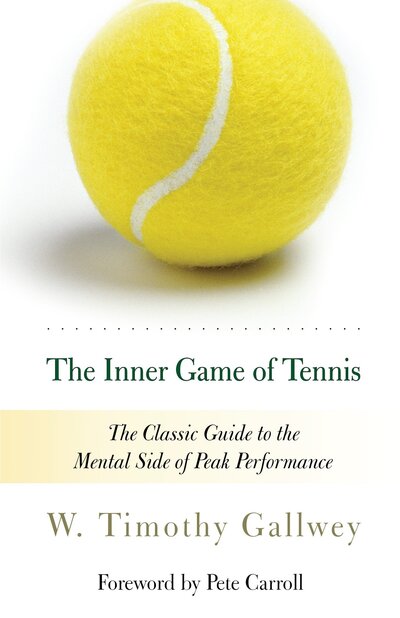 White book cover with lime green tennis ball