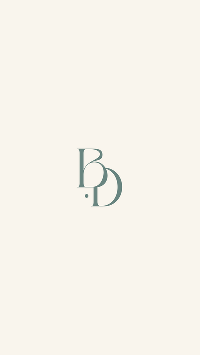 Britni Dean Photography monogram logo on a white background