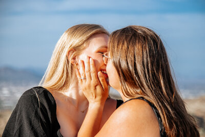 two women kiss after proposal