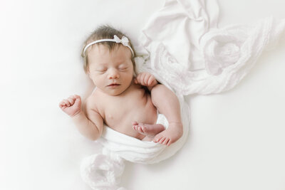 Two month old newborn photos in Bentonville AR Studio