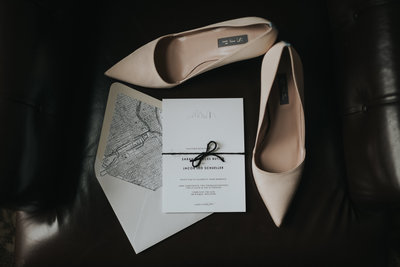 wedding invite with shoes detail