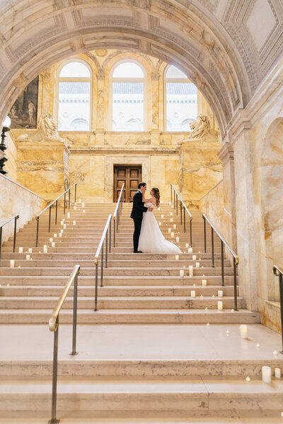 Bride and Groom on the steps of the Boston Public Library