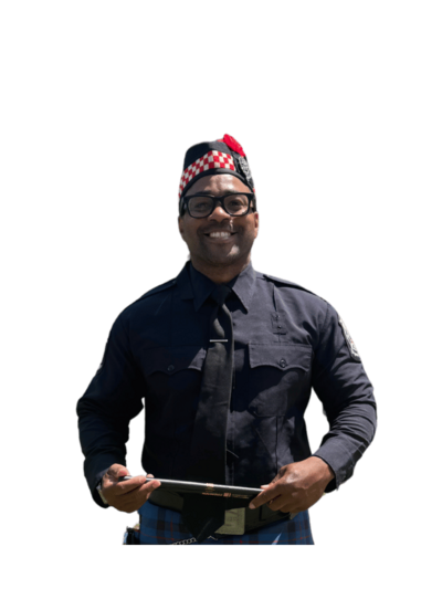 Kenny White, Drum Sergeant of Local 935 Pipes and Drums, ready to call you out if you're off beat.