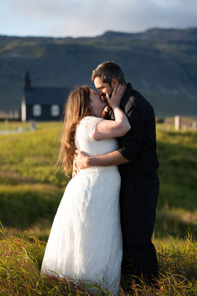Couple eloping at the Black Church Búðakirkja in Iceland