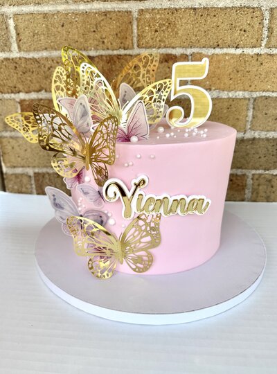 Fun and colorful kids' cake from Icing on the Cake Bakery, designed with playful decorations and delicious frosting for a perfect celebration.