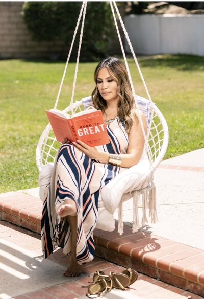 Mayra Menjivar, founder of Warrior Woman, reading a book