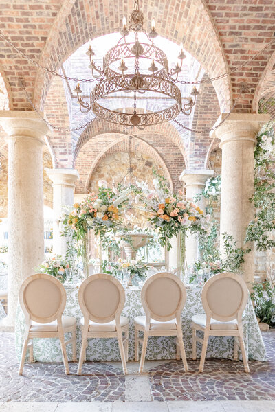 bright light and airy wedding photo of bride  with bouquet