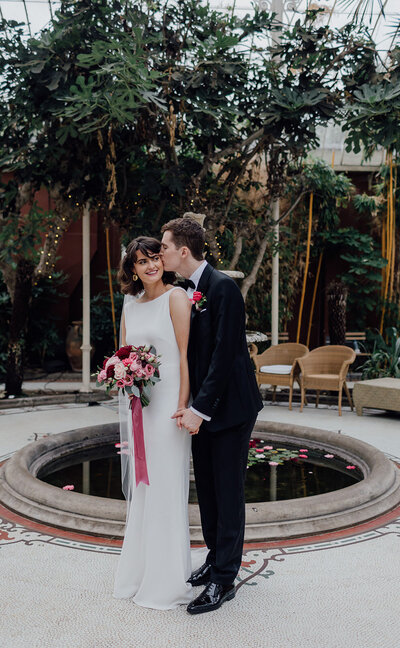 bride-and-groom-in-conservatory-kilshane-house