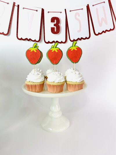 Strawberry cupcake toppers with red and green