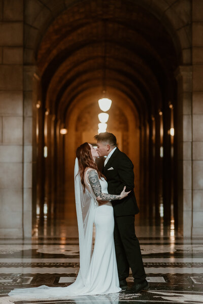 intimate elopement style wedding inside at the Nebraska state capital. building