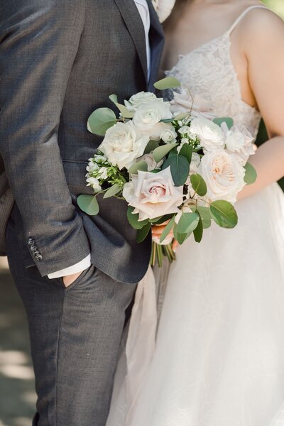 Bride holding white bouquet