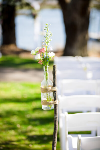 "Detail shot of flowers at a wedding ceremony in Southport NC"