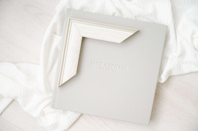 slate grey newborn album designed by cedar falls photographer