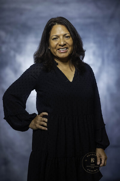 Professional portrait of Sandra Bridges, lead filmmaker at Bridges Cinema, smiling warmly.