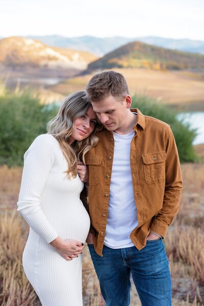 pregnant woman in white dress at Emigrant Lake