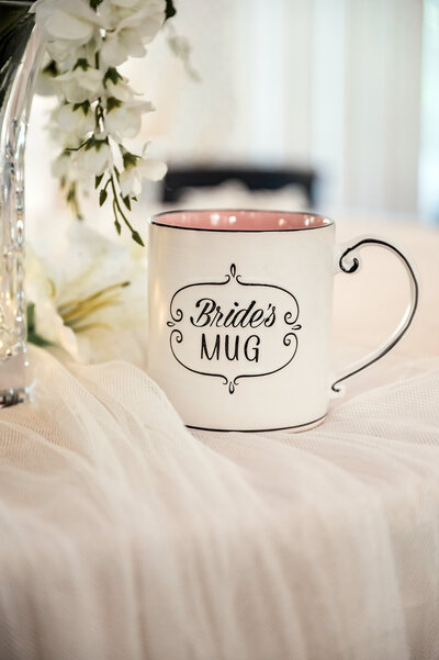 Wedding Day Detail Photo of Cup with Veil - Jennifer Mummert Photography