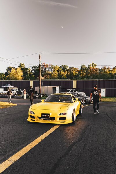 yellow sports car at corporate event