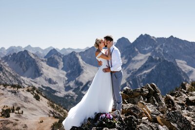 A couple getting married on a peak in the Sawtooth Mountains in Idaho