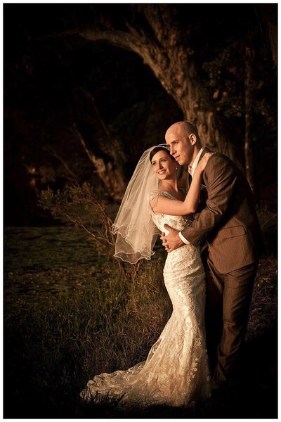 wedding couple by creek Hedlow Retreat, Rockhampton, QLD