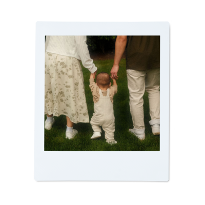 Family photo of Cindy, her husband, and son. 