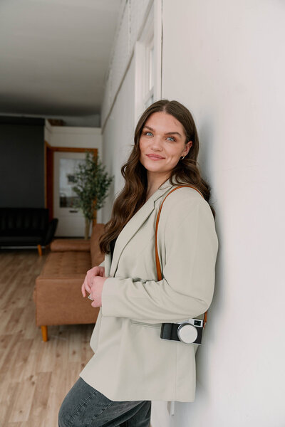 Portrait of photographer Raechel at Honeytree Studio in Kalamazoo, Michigan for her brand imagery.