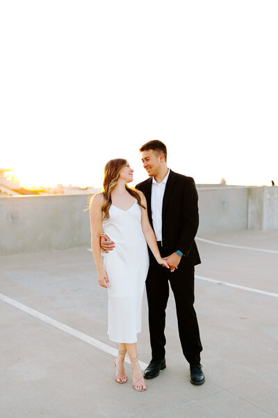 This modern rooftop engagement session in Oklahoma City captured golden hour light, downtown views, and effortlessly chic style. Perfect inspiration for couples wanting a romantic yet elevated engagement shoot in the heart of OKC.