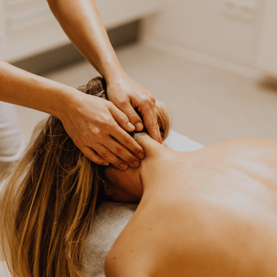 Relaxing head massage on woman patient
