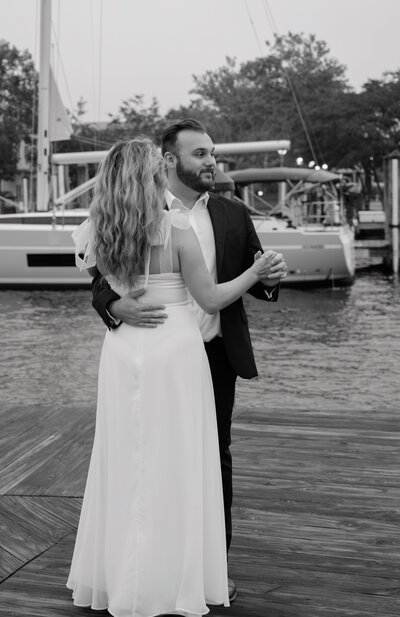 maryland couple holding each other on beach