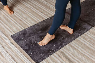 Client practicing body awareness during integrative physical therapy with Dr. Parkar Price at Throughline Wellness Studio.