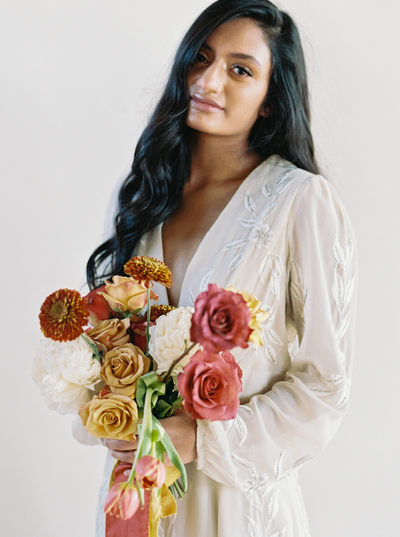 Dedicated outsource private photo editor offering custom and bespoke photo editing services, specializing in film matching and emulation for wedding photographers.