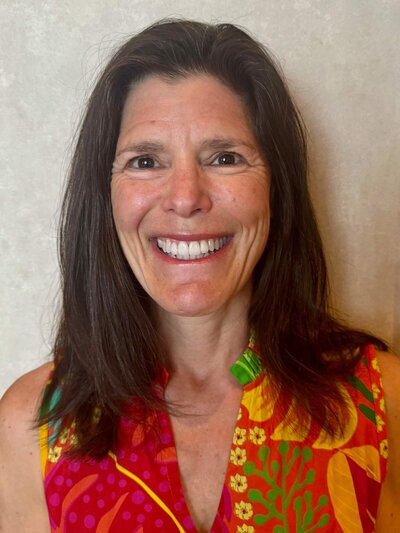 Michele Gladieux, an OPWF board member, smiles. 
