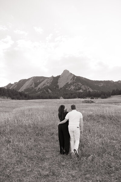 Newborn photo session of a family sharing a heartfelt moment in Boulder Colorado