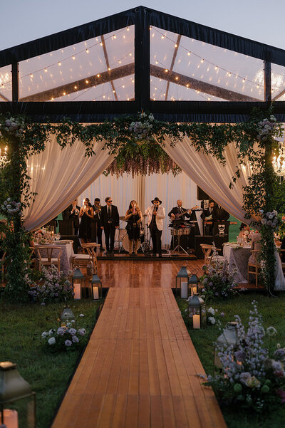 Barn at Willow Hill Event Venue set for a wedding reception, featuring an elegant tablescape with fresh yellow florals, creating a beautiful and inviting atmosphere