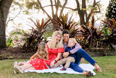 Groom kisses brides cheek before their Floridan Palace wedding in Tampa