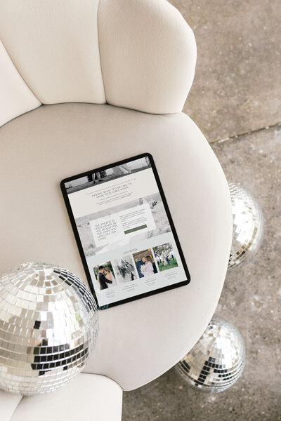 Custom Showit website for wedding photographer and videographer shown on an iPad