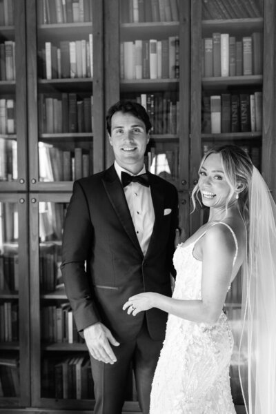 bride and groom walking on chalmers street in downtown Charleston