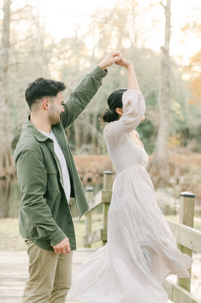 Couple dancing at their Houston engagement photo session