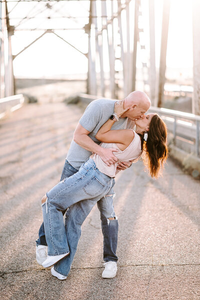 husband and wife kissing