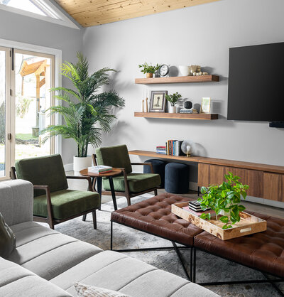 Gray and green living space with greenery.