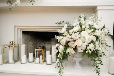 floral design next to candles and lanterns