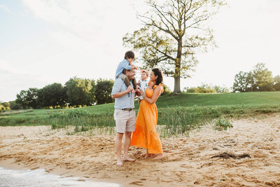 Family in creek near forest at Jerusalem Mill Baltimore Maryland