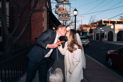 bride and groom about to kiss