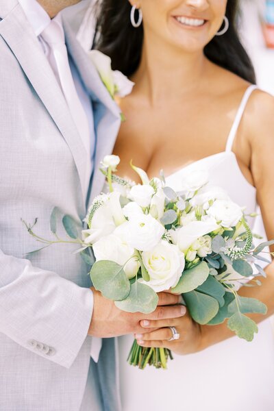 Bride and groom close up of bouquet