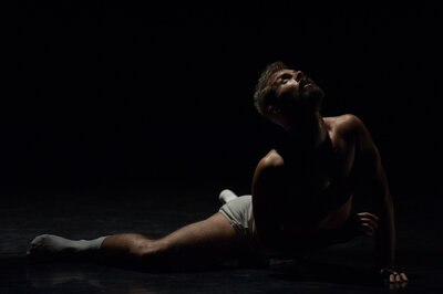Joshua Beamish of Move the Company  on stage performing Ablaze a new choreographic work by Kirsten Wicklund