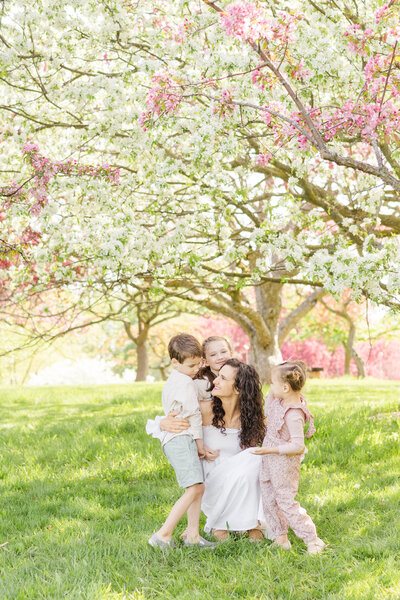 a beautiful cherry blossom session in Minneapolis of a mother and her children