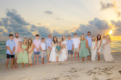 Fun, extended family photoshoot on Anna Maria Island on the beach at sunset