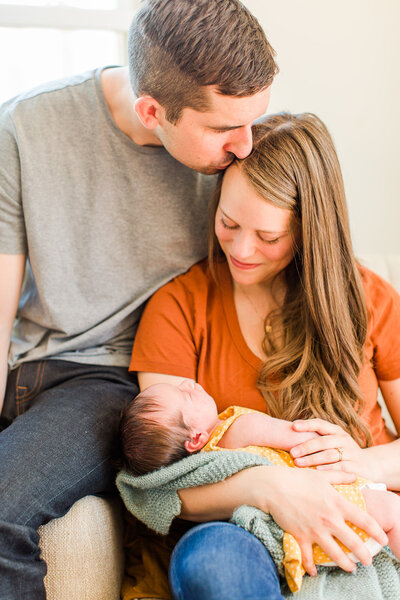 couple with newborn baby