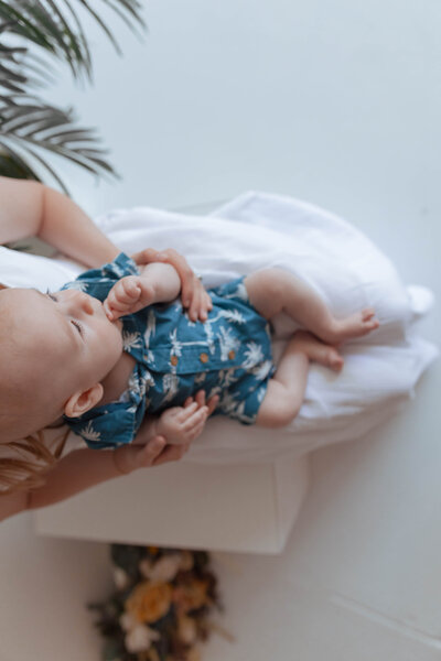 Natural-light photography studio with white walls and modern furniture in Troy, MO
