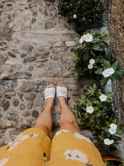 feet on cobblestone