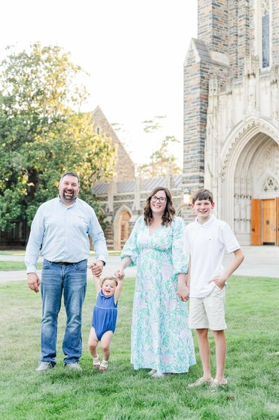 Savannah photographers Tiffany and her family smiling outdoors